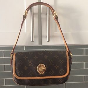 Authentic Louis Vuitton Tikal Bag